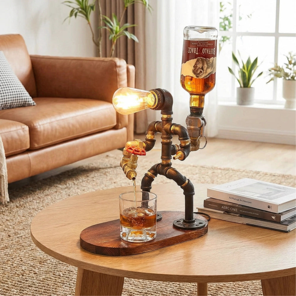 Decorative lamp made of pipes pouring a drink into a glass on a wooden table.