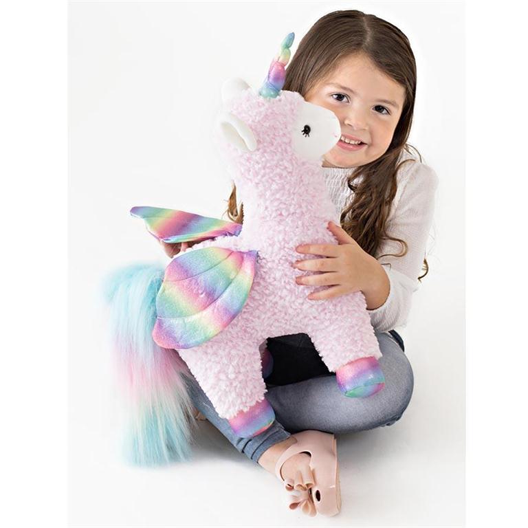 Girl with llamacorn plush toy