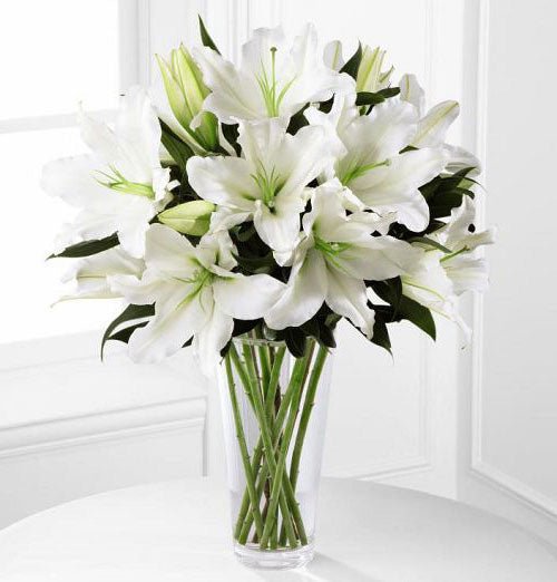 Light in your Honor funeral flower arrangement of all white flowers Small