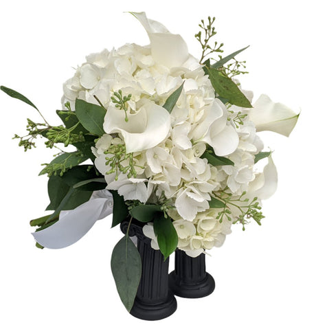 White hydrangea and calla lily clutch bouquet - White
