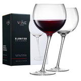Tipsy leaning wine glasses