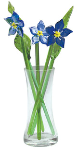 Glass forget me not flowers in vase